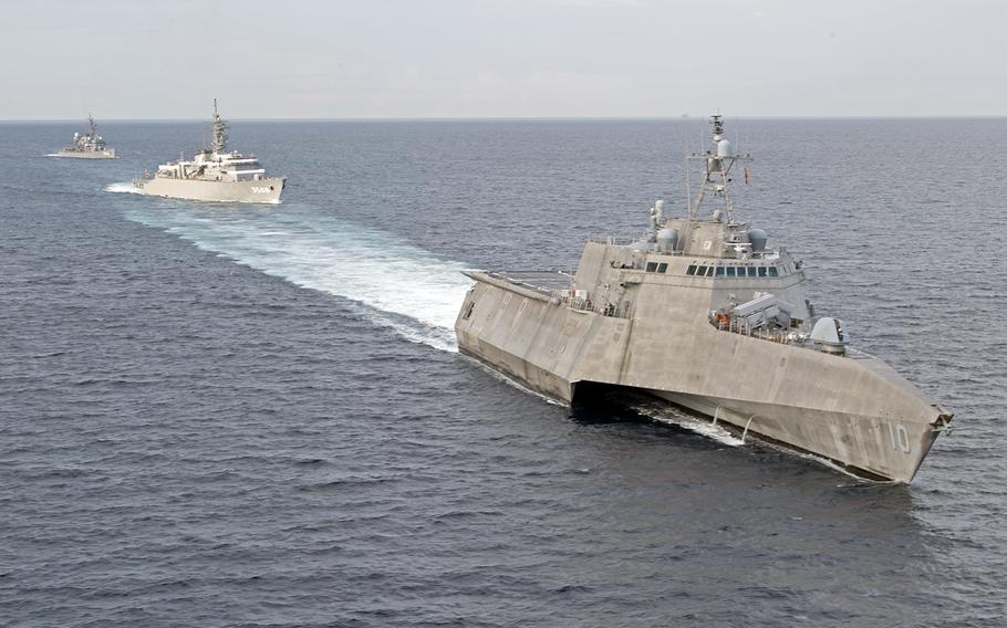 USS Gabrielle Giffords drills with two Japanese ships in the South